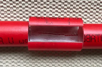CPI Dura-PEX pipe showing crack damage